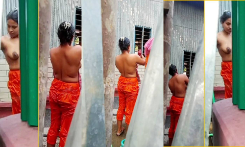 Indian Woman Bathing Outside The House